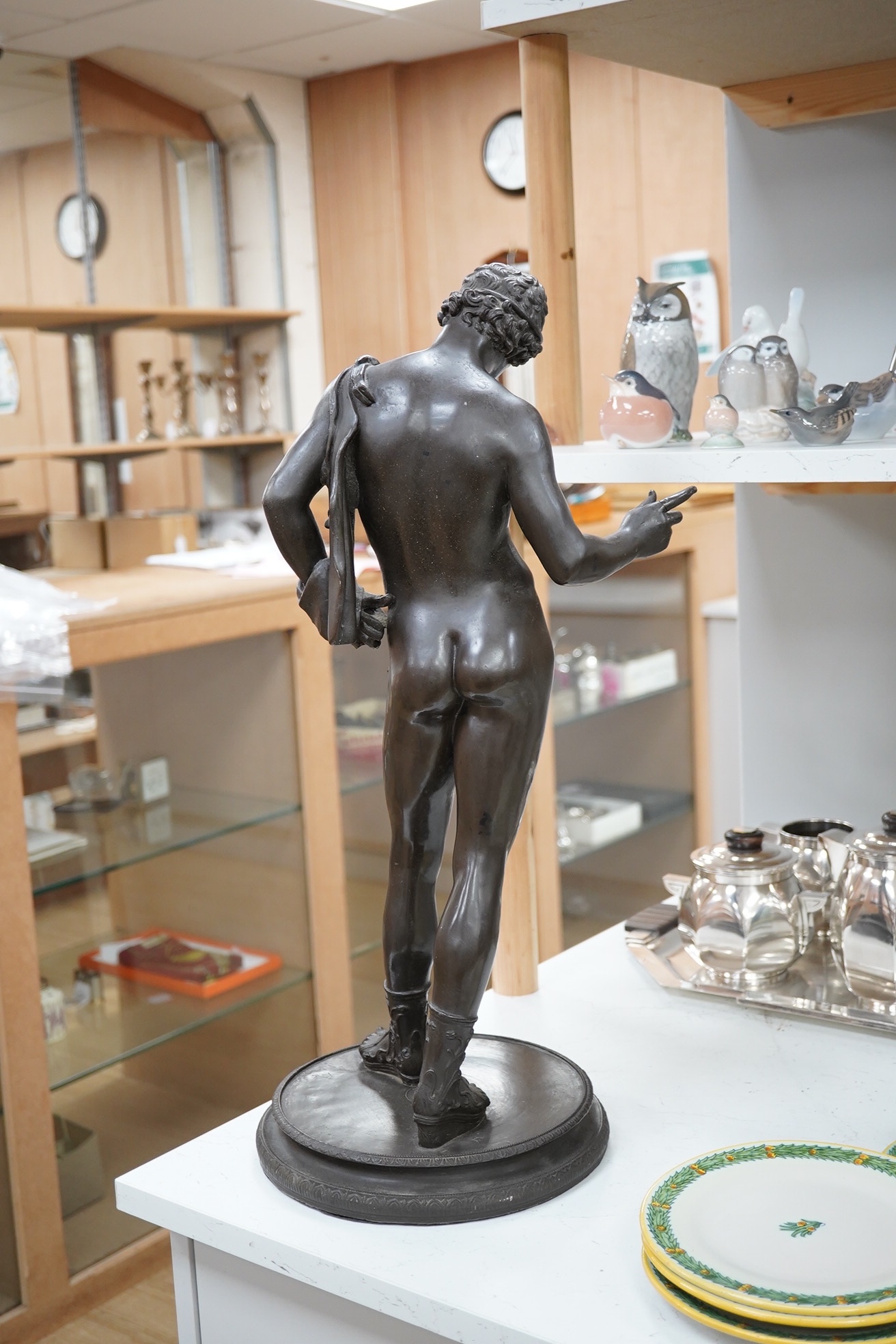 A bronzed resin figure, of Narcissus, 56cm high. Condition - good